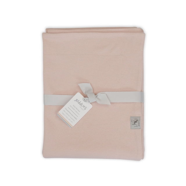 Juddlies Designs - Baby - Mini Waffle Baby Blanket - Machine Washable - Pine, folded mini waffle knit baby blanket in pale pine color with a textured pattern, tied with a light gray ribbon and a white tag, measuring 29 by 40 inches, brushed for extra softness and ideal for nursery use.