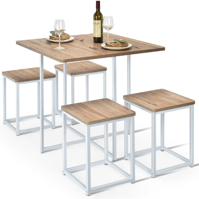 Giantex 5 Piece Dining Table Set, a modern dining room furniture set with a square natural wood-tone table and four stools featuring white powder-coated iron frames. Designed for small spaces, the stools can be tucked under the table for space-saving convenience. Made with durable MDF wood and a scratch-resistant melamine surface, this set is easy to clean and maintain, perfect for apartments, coffee shops, or compact dining areas.