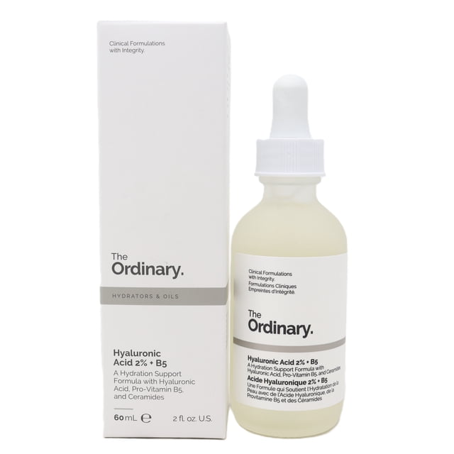 The Ordinary. Hyaluronic Acid 2% + B5 Hydrating Serum 2.0oz/60ml, displayed alongside its box. The serum bottle is made of frosted glass with a white dropper cap, while the box features the product name and details in black text on a minimalist white design.