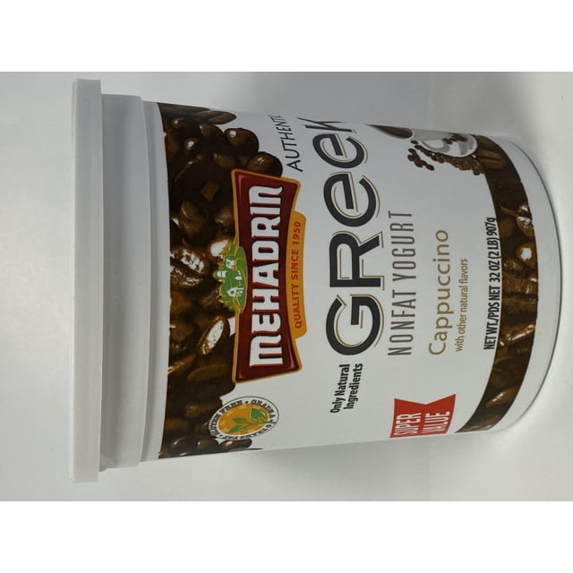 Mehadrin Greek yogurt Cappuccino BIG 2 Lb tub with white lid, decorated with coffee bean graphics and Mehadrin logo, labeled nonfat cappuccino-flavored yogurt with natural ingredients, 32 oz (2 lb) 907 g net weight, refrigerated dairy product often used as a breakfast or snack option.
