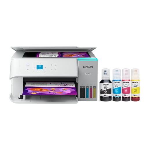 Epson EcoTank ET-2980 Wireless All-in-One Colour Supertank Printer in white with front-facing control panel and 1.44-inch colour screen, printing a colourful cartoon page. Supersized ink tanks and included black, cyan, magenta, and yellow bottles emphasize cartridge-free, wireless family printing.