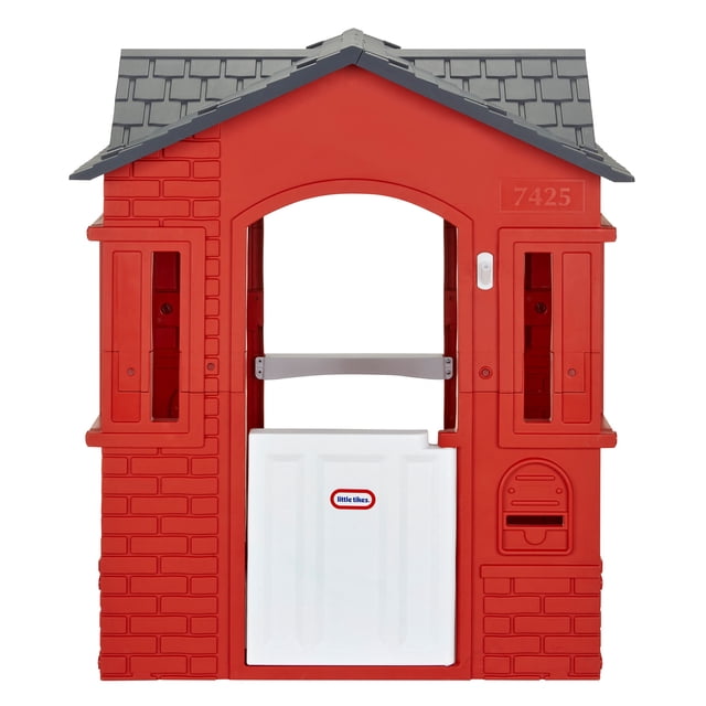 Little Tikes Cape Cottage Playhouse -- Red with gray shingled roof, white working door featuring the Little Tikes logo, two red windows with shutters, a mail slot, and brick pattern walls, designed for indoor and outdoor imaginative play.