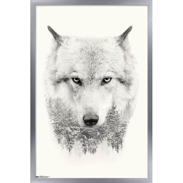 Wolf - Trees Wall Poster, 22.375" x 34", depicts a front-facing grayscale wolf head with piercing eyes blending into a snowy pine forest at the base, printed on glossy satin finish paper with a silver frame, suitable for decorating bedrooms, offices, or dorm rooms.