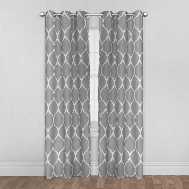 Mainstays Ogee Print 84" Light Filtering Drapery Grommet Window Curtains Panel in grey with a white serpentine ogee pattern, made of 100% polyester light filtering fabric, featuring a sturdy grommet top on a silver curtain rod, ideal for softening natural light and enhancing room style.