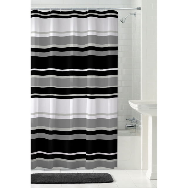 Mainstays James Stripe PEVA Shower Curtain or Liner with waterproof, PVC-free horizontal black, gray, and white stripes, measuring 70 by 72 inches, featuring a durable buttonhole top compatible with standard hooks, hanging in a white tiled bathroom with a bathtub and chrome showerhead, suitable for use alone or paired with a fabric curtain.
