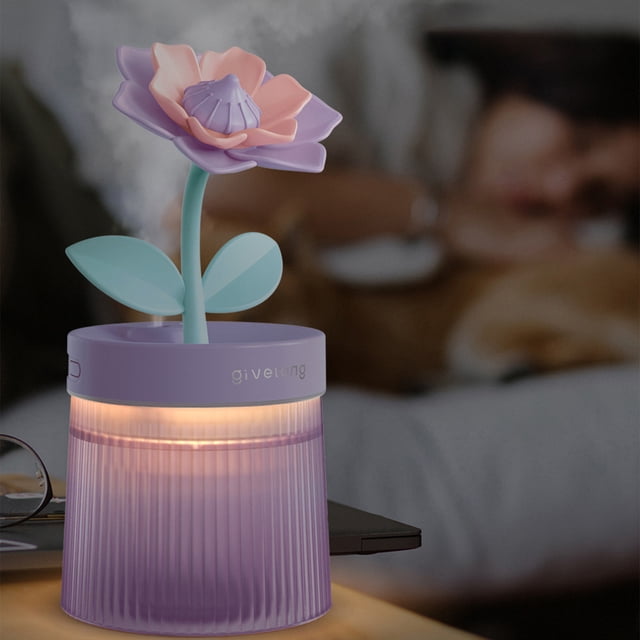 EGNMCR USB Humidifier with Light in purple, designed with a flower-shaped top featuring pastel pink petals and green leaves. This portable humidifier emits a quiet cool mist and has a 260ML water tank. USB-powered, it includes colorful light effects and is ideal for bedrooms, offices, and small spaces. Made of Acrylonitrile Butadiene Styrene, it is compact and easy to clean.