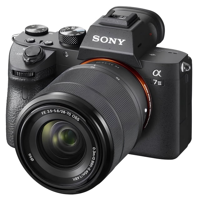 Sony Alpha a7 III Mirrorless Digital Camera with 28-70mm Lens ILCE7M3K/B. Features a 24.2MP resolution for lifelike detail, ISO range of 100-51,200 (expandable to 50-204,800), and high-speed continuous shooting. Includes an FE 28-70mm F3.5-5.6 OSS standard zoom lens. Shown in a sleek black design with ergonomic controls and a compact body.