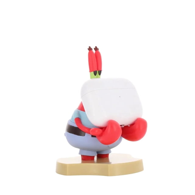 Exquisite Gaming Mr Krabs Spongebob Squarepants Holdem, Mini Cable Guy Phone Stand and Device Holder featuring a 4-inch tall Mr Krabs figure holding a white wireless earbud case with red claws and blue pants on a beige base, suitable for organizing phones, earbuds, and small gadgets.