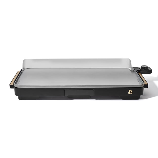 Beautiful XL Electric Griddle, 12" x 22", with a non-stick surface, detachable stainless steel backsplash, black base with gold accents, cool-touch handles, removable heat control dial from 200°F to 400°F, and drip tray for fat collection, suitable for cooking large family meals.