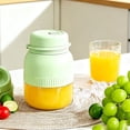 thumbnail image 4 of Tong Portable Juice Extractor With Lid—Compact Juicer For Fresh And Squeezed Drinks, 4 of 5