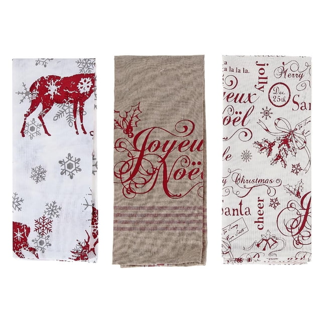 Printed Joyeux Noel Cotton Kitchen Towel (Asstd)-Set of 3 with three folded cotton towels featuring Christmas designs: a white towel with red reindeer and grey snowflakes, a beige towel with red 'Joyeux Noël' script and holly, and a white towel with red festive words and holly, ideal for kitchen use and quick drying.