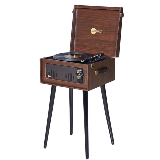 Arkrocket Discovery Tourne-Disque Rétro Bluetooth à 3 Vitesses, Fini Noyer Foncé, avec Haut-Parleurs Intégrés et Pattes Détachables. Doté d'Une Tourne-Disque à 3 Vitesses avec Entraînement par Courroie Prenant en Charge 33,3, 45 et 78 Tr/min. Comprend la Diffusion Bluetooth, une Prise pour Écouteurs, une Sortie RCA et des Haut-Parleurs Stéréo Intégrés avec Aigus et Basses Ajustables. Le design d'Inspiration Vintage Ajoute une Touche Rétro à Toute Pièce.