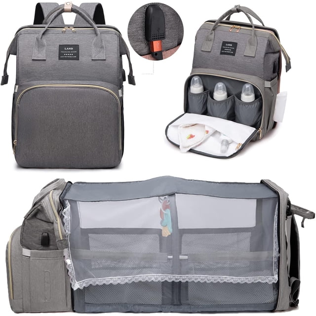 Sac à Dos à Couches par GRM de Couleur Grise, Conçu pour les Essentiels pour Bébé et les Voyages. Fabriqué en Tissu Oxford 300D Imperméable, Il Comprend des Bretelles en Éponge Souple, un port de Chargement USB, des Poches Isolées pour Bouteilles, des Poches Latérales pour Mouchoirs, une Poche Antivol et une station de Changement de Couches Intégrée. Offre une Grande Capacité et un Rangement Multifonctionnel.