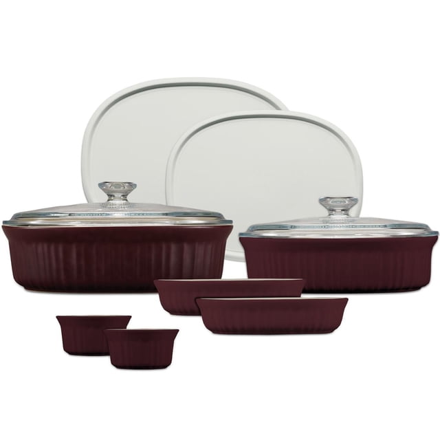 CorningWare® French Colors 10-pc Set, Cabernet, with two large oval stoneware baking dishes with glass lids, two smaller oval dishes, and two ramekins in deep cabernet color, plus two white plastic storage lids; all pieces are oven, freezer, microwave, and dishwasher safe, suitable for baking, serving, and storing food.