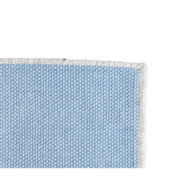 Fabstyles 100% Cotton Bali Table Runner measuring 14 x 72 inches in light blue with a textured woven cotton fabric and white fringed edges, suitable for indoor and outdoor dining tables.