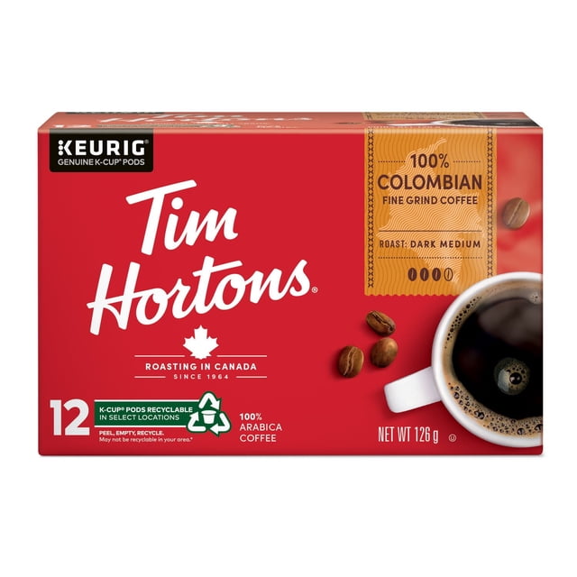 Tim Hortons 100% Colombian Dark Medium Roast Coffee K-Cup 12ct box with red packaging featuring the Tim Hortons logo, a maple leaf symbol for roasting in Canada, coffee beans, and a white cup filled with black coffee, highlighting recyclable K-Cup pods and 100% Arabica beans grown in Colombia's volcanic soil.