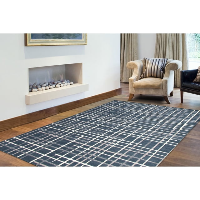 ECARPET Abstract Striped Area Rug, Modern Indoor Carpet Tessa Collection on hardwood floor in a living room with a beige armchair, featuring a dark base with intersecting light and grey stripes forming an abstract grid pattern, ideal for adding warmth and style to indoor decor.