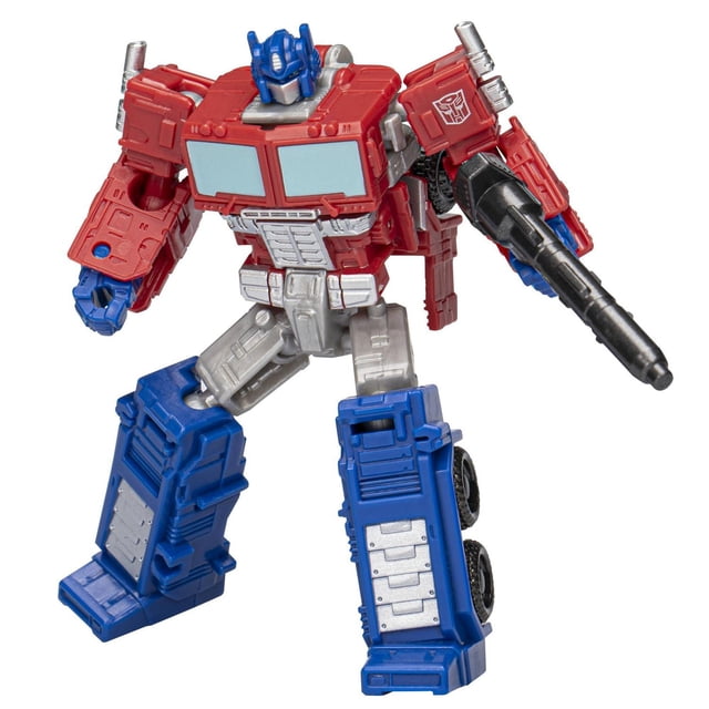 Transformers Toys Legacy Evolution Core Class Optimus Prime Toy, 3.5-inch action figure in robot mode with red torso, blue legs, and silver detailing, holding a black Ion blaster accessory, ideal for boys and girls ages 8 and up and suitable as a collectible battling toy.