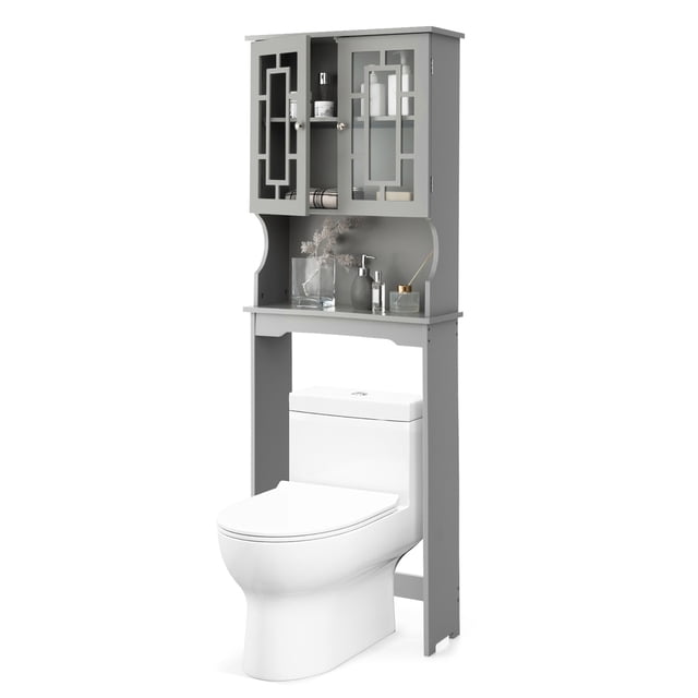 Gymax Armoire de Rangement Grise pour Salle de Bain au-Dessus de la Toilette, Étagère Organisatrice avec Conception Autoportante avec Armoire à 2 Niveaux, Compartiment de Rangement Ouvert et Portes en Verre Trempé. l'Armoire Comprend une Tablette Réglable à 3 Niveaux pour un Rangement flexible et s'Adapte à la Plupart des Toilettes standard avec un Dégagement de 33 Pouces. Fabriquée en Bois d'Ingénierie et en MDF, Elle Est Robuste et Comprend des Dispositifs Anti-Basculement pour la Sécurité. les Dimensions Sont de 23,5 Pouces de Large, 8,5 Pouces de Profondeur et 67 Pouces de Hauteur.