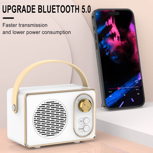 TIMIFIS Bluetooth Speakers Wireless Retro Bluetooth Speaker featuring a compact, white rectangular design with a gold-tone knob and buttons for volume control. It includes a beige leather handle for portability and is shown next to a smartphone playing music. This mini portable speaker supports Bluetooth 5.0 for faster transmission and lower power consumption, offering 360° stereo sound and multiple playback modes. Ideal for indoor, outdoor, camping, or office use.