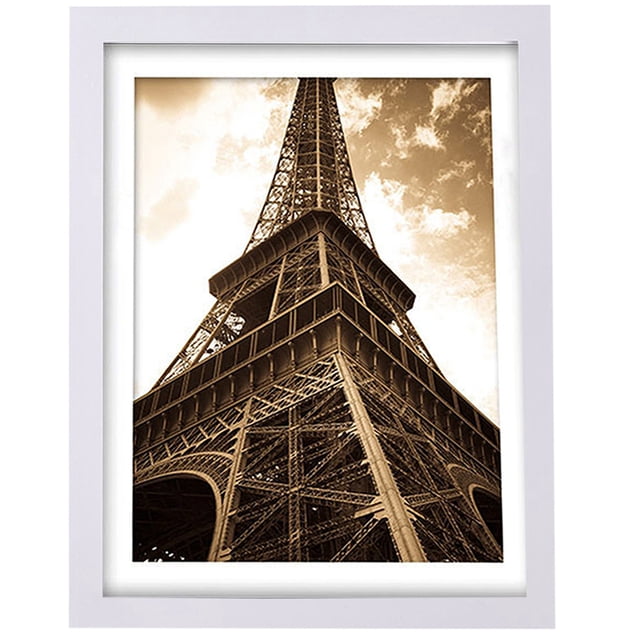 Coofit Photo Frame Multipurpose Wood Picture Frame in a white finish, displayed with a sepia-toned image of the Eiffel Tower. Made of durable, eco-friendly wood, this frame is suitable for wall mounting and comes with a mounting kit. Available in five sizes, it is ideal for room decor or as a thoughtful gift.