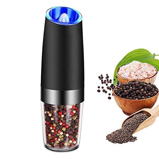 Gravity Electric Salt Grinder Pepper Grinder by Flyflise, featuring a sleek black and transparent design with a blue LED light at the top. This battery-operated grinder offers automatic operation with gravity sensing, adjustable ceramic grinding coarseness, and one-hand usability. Shown with colorful peppercorns in the transparent chamber and bowls of salt and pepper in the background.
