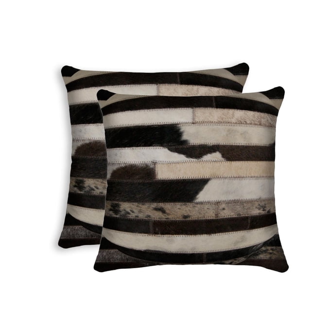 H-Natural Torino Madrid Cowhide 2-Pack Pillows with large square shape, patchwork of black, white, and brown Indian cowhide strips hand-stitched with zigzag seams, ultra-soft microsuede backing, and hidden zipper closure, suitable for layering in home décor and adding warmth.