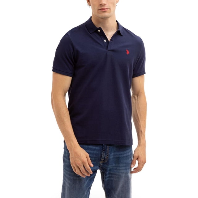 U.S. Polo Assn. Men's Solid Interlock Short Sleeve Polo in navy blue featuring a two-button collar placket and red embroidered logo on the left chest, made from breathable, lightweight interlock fabric ideal for warm weather and casual wear.