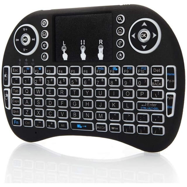 SANOXY Télécommande avec Pavé Tactile Clavier Rétroéclairé Portatif Doté d'Une Disposition QWERTY Compacte avec 94 Touches en silicone Souple, un Pavé Tactile avec DPI Réglable et Boutons de Souris Droit et Gauche. le Clavier Comprend un Rétroéclairage Rouge, Vert et Bleu, un Interrupteur Marche/arrêt, et Fonctionne jusqu'à 10 Mètres via une Batterie lithium-ion rechargeable de 1020 mAh. Conçu pour PC Multimédias, Téléviseurs Intelligents et Boîtiers Android TV, Il Mesure 5,7 x 3,9 x 0,7 Pouces et Pèse 3,5 oz Sans la Batterie