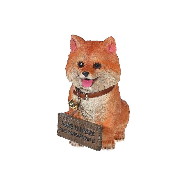 IH Casa Decor Pomeranian With Sign Bentley decorative object made of polyresin, depicting an orange and cream Pomeranian dog sitting with a brown collar and bell, holding a wooden sign that reads 'Home is where the Pomeranian is', ideal for home décor accents.