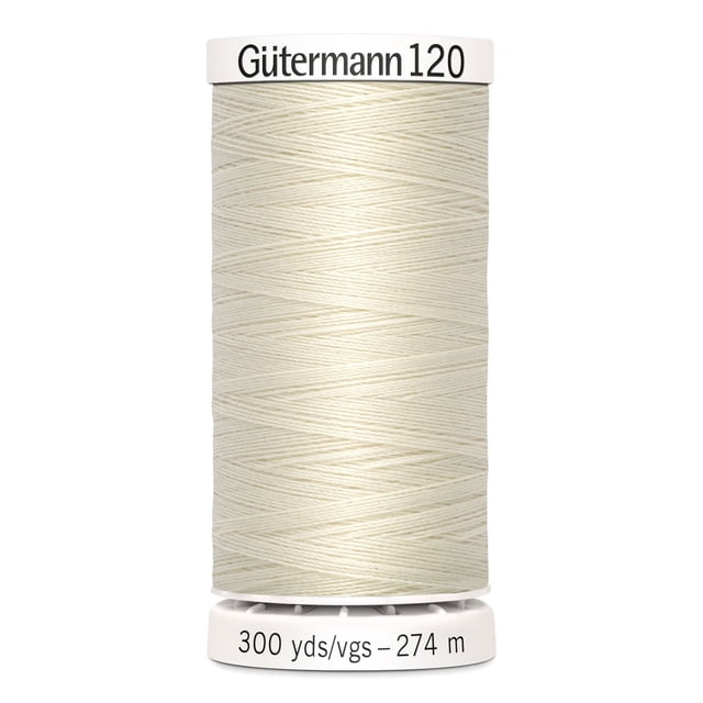 Gutermann 120 100% polyester all purpose thread spool in off-white, tightly wound with label showing 300 yards (274 meters). Suitable for machine and hand sewing various fabrics including cotton and synthetics, also ideal for craft and mending projects.