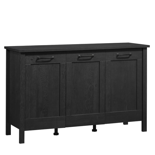 Sauder Select Storage Cabinet in Raven Oak finish, featuring three framed doors with metal hardware. The cabinet includes adjustable shelves behind each door, suitable for 12" x 12" storage bins (sold separately). Its dark, elegant design offers a spacious top surface for decorative items, making it ideal for organizing and displaying household essentials.