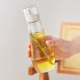thumbnail image 1 of Glass Oil Dispenser Bottle with Spout and Measuring Cup for Kitchen Countertop Storage and Easy Pouring, 1 of 2
