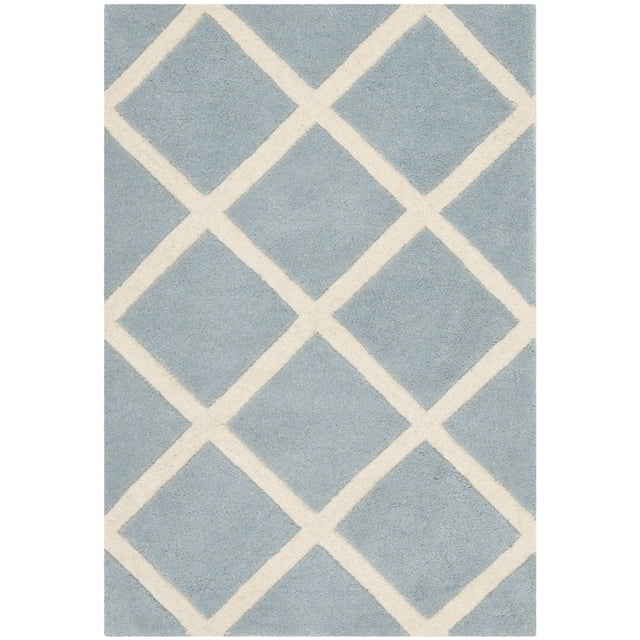 Safavieh Chatham Isaac Geometric Diamonds Area Rug featuring hand-tufted wool with a light blue background and off-white geometric diamond pattern, medium pile height for softness, suitable as an accent rug to add warmth and texture to contemporary home interiors.