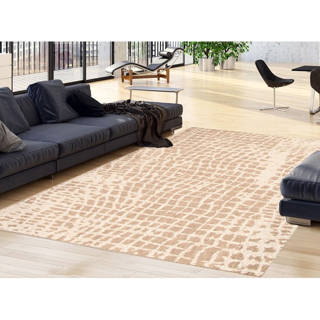 ECARPET Indoor Outdoor Area Rug for Patio, Deck, Living Room Sisal Safari Collection with a beige and light brown sisal-inspired textured pattern, placed on light hardwood flooring in a modern living space with a dark gray sectional sofa, chaise lounge, and black swivel chairs, ideal for enhancing both indoor and outdoor areas.