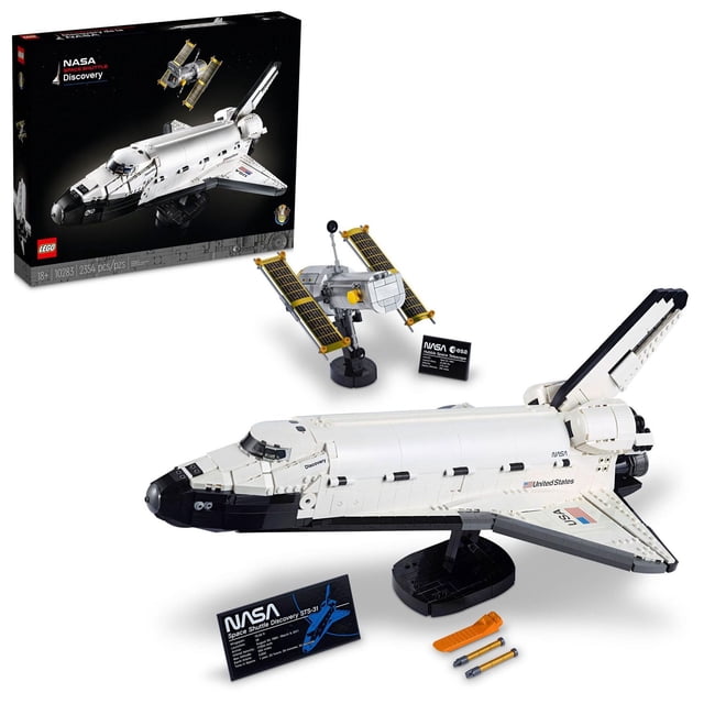 LEGO NASA Space Shuttle Discovery 10283 Toy Building Kit with 2,354 pieces, featuring a detailed model of the Space Shuttle Discovery and the Hubble Space Telescope from NASA's 1990 STS-31 mission. The multicolour set includes authentic features like an opening payload bay, retractable landing gear, adjustable elevons, and a cockpit with seating for five crew members. The Hubble Telescope has movable solar panels and an aperture door. Display stands are included for showcasing the shuttle and telescope individually or together. The set is designed for adult builders and space enthusiasts.