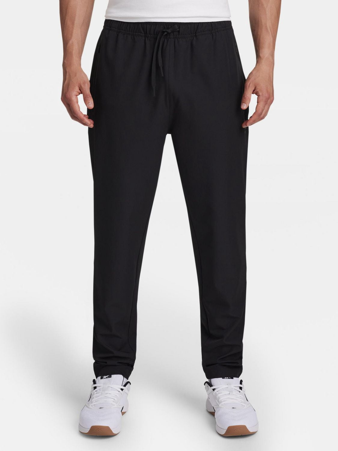 Reebok Pantalon fuselé tissé urbain pour homme