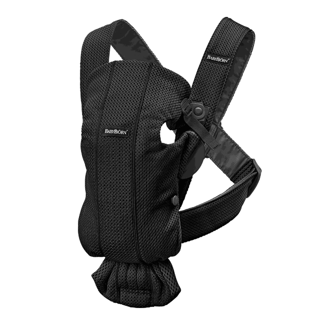 BabyBjorn Baby Carrier Mini in black 3D mesh, ideal for newborns up to 24 lbs. Features adjustable seat and head support, breathable fabric for comfort, and two front carrying options. Compact baby gear for short sessions, with a front section that opens for easy removal.