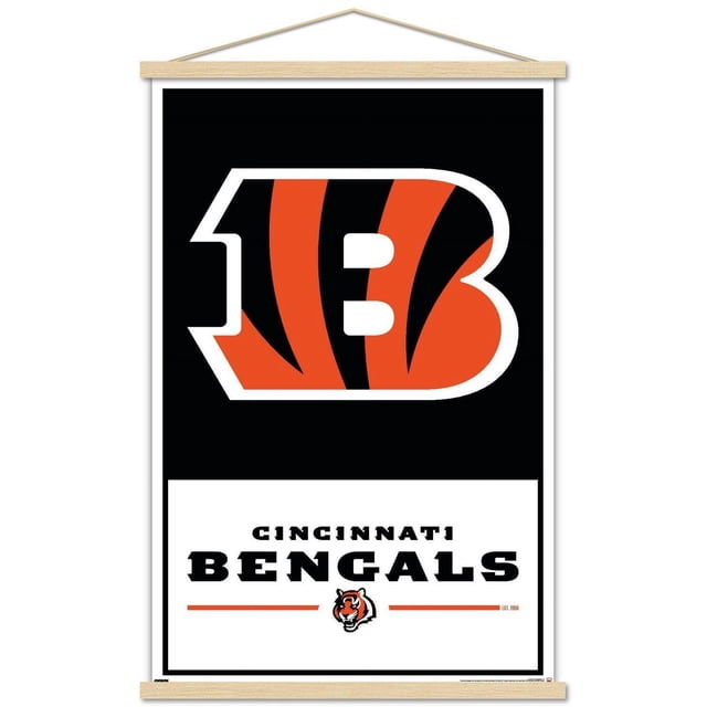 NFL Cincinnati Bengals - Logo 21 Wall Poster with Magnetic Frame, 22.375" x 34" displaying a centered, front-facing orange and black striped 'B' logo outlined in white on a black background, with bold 'CINCINNATI BENGALS' text and a small tiger head emblem below on a white panel accented by orange lines, framed in a light wood magnetic frame ideal for wall art, home décor, and party decoration.