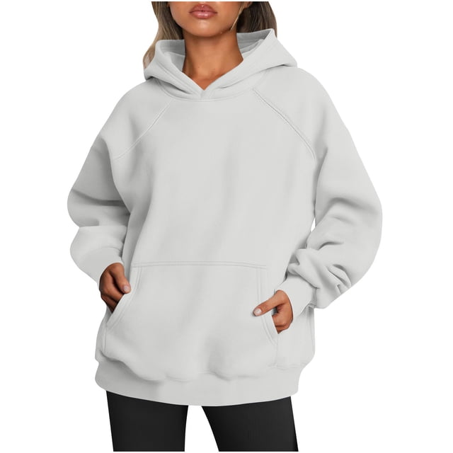 RKSTN Hoodies for Women Fall Solid Color Basic Loose Hoodie Plus Size Sweatshirt in grey. This long-sleeve pullover features a drop shoulder design, kangaroo pocket, and hooded collar. Made from lightweight polyester, it offers a casual and comfortable fit, ideal for autumn and winter. Shown in a front-facing view, paired with black pants.