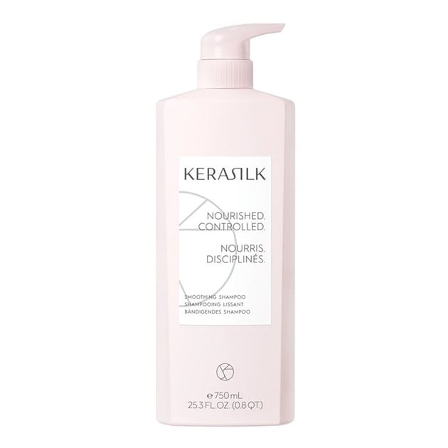 Kerasilk Smoothing Shampoo - 750ml bottle with a soft pink design and pump dispenser. The label highlights its vegan formula, infused with Biomimetic Silk and Shea Oil, designed to tame frizz, nourish coarse, curly, or unruly hair, and improve manageability. Ideal for gentle cleansing and hair care, removing buildup and neutralizing hard water.