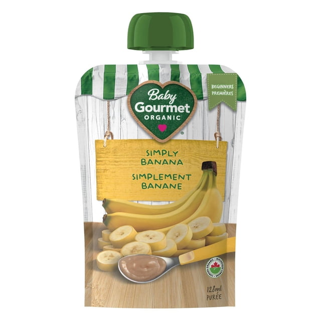 Baby Gourmet Purée de Banane Biologique Simply dans un Sachet Sans BPA de 128 ml avec Bouchon Vert à Torsion, Présentant des Bananes Entières et Tranchées sur une surface en Bois, Étiquetée pour les Débutants en Nourriture pour Bébé avec Texte Bilingue Anglais et Français et certification Biologique Canadienne.