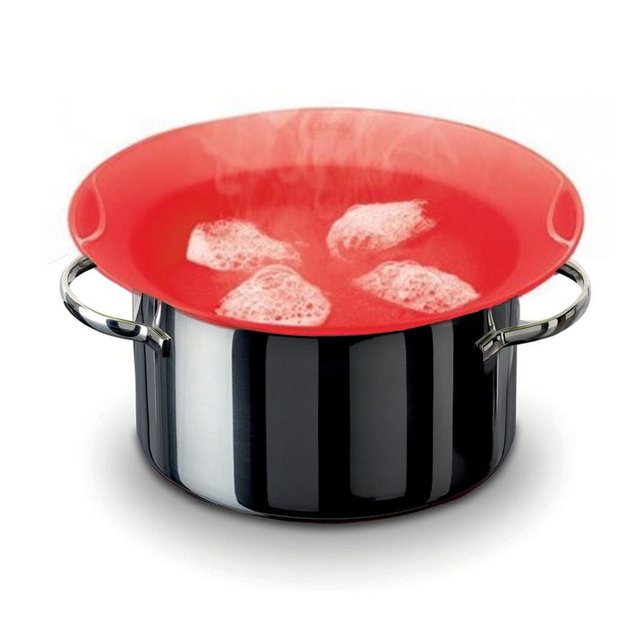 Lekue 22cm Red Non Spill Lid made of silicone covering a stainless steel pot with two handles, containing boiling water with steam and bubbles, designed to prevent spills and keep kitchen surfaces clean during cooking.