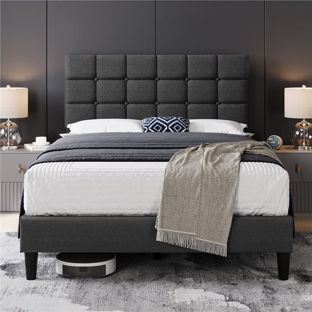 Yaheetech Modern Upholstered Platform Bed with Square Tufted Headboard, Full, Dark Gray. This platform bed features a dark gray linen-blend upholstery, square tufted foam-padded headboard, and a durable wooden frame. With 12 wooden slats supporting up to 750 lbs, it eliminates the need for a box spring. Ideal for modern bedroom furniture setups, the bed is displayed in a contemporary room with matching decor and nightstands.