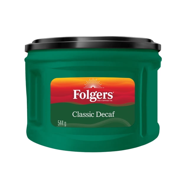 Folgers Classic Decaf Medium Roast Ground Coffee 544 g in a green plastic container with a black lid, featuring the Folgers logo on a red and orange gradient label, crafted for smooth, full-bodied decaffeinated coffee with a balanced flavour.