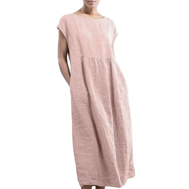 Innerwin Dresses Crew Neck Ladies Dress Beach Solid Color Loose Sundress in pink, size 2XL. This maxi-length dress features a crew neckline, short sleeves, and a loose, baggy fit with pockets. Made from a lightweight blend of 65% cotton and 35% polyester, it is soft and breathable, ideal for casual, beach, or vacation wear. The solid pink color and swing hem design add a bohemian touch, suitable for pairing with sandals or heels for a stylish summer look.