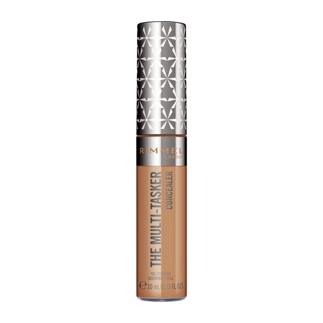 Rimmel Multi-Tasker Concealer in a 10 ml (0.33 fl oz) tube with a large soft wand applicator, medium beige shade, offering full coverage, crease-proof, transfer-proof, and waterproof formula that conceals blemishes and brightens dark circles, featuring a silver cap with white geometric pattern and Rimmel London branding.