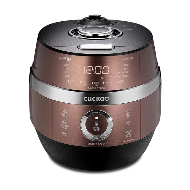 CUCKOO CRP-JHR1009F 10-Cup (Uncooked) / 20-Cup (Cooked) Induction Heating Pressure Rice Cooker in copper and black. Features a nonstick inner pot, 16 menu options including GABA rice and brown rice, and Fuzzy Logic technology for precise cooking. Includes an LED screen with touch controls, a 3-language voice guide, and an auto-clean function for convenience. Designed with a 304 food-grade stainless steel inner pot and induction heating for even heat distribution.