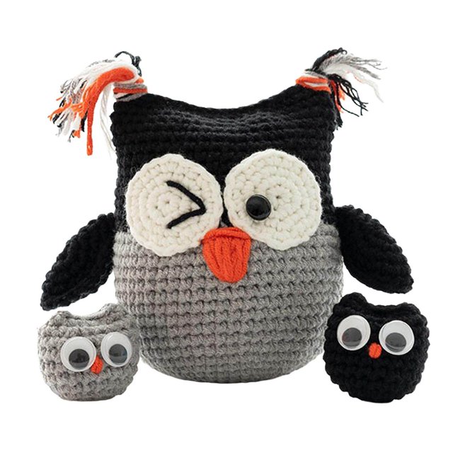 DIY Crochet Kit Hand Knitting Toy Kit by Ruiboury featuring a completed owl-themed crochet project. The set includes a large black and grey owl with white and orange accents, accompanied by two smaller owl figures. Suitable for beginners and adults, this craft set is ideal for birthdays or as a creative gift.
