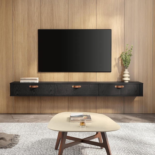 FITUEYES Meuble Télé Flottant Noir, Console Multimédia Moderne de 70 Pouces Centre de Divertissement avec 3 Portes Rabattables pour Salon, Console Flottante de 70 Pouces Orientée vers l'Avant pour Chambre avec Fini Noir Riche, surface à Grain de Bois Naturel, Poignées de Tiroir en Cuir et Deux Trous de Gestion des Fils. Convient au Salon Ou à la Chambre, Souvent Utilisé comme Étagère d'Exposition Murale pour photos Encadrées Ou Petites Plantes.